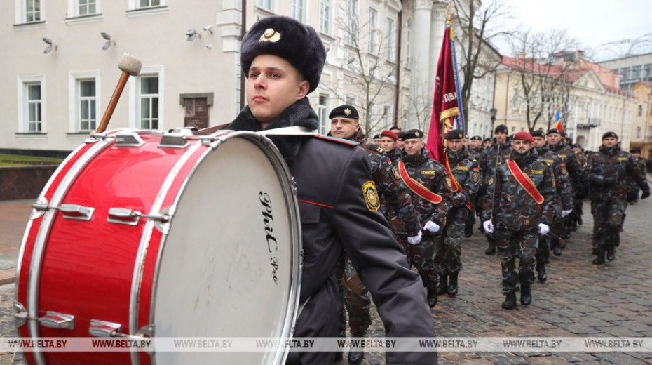 Police officers march through city center in Grodno